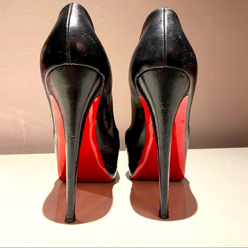 Christian Louboutin's black leather peep-toe pumps